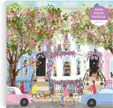 Galison Spring Terrace – 1000 Piece Joy Laforme Puzzle Featuring a Magnolia Filled Neighborhood Day On A Spring Day